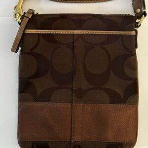 New never used Brown crossbody Coach bag.